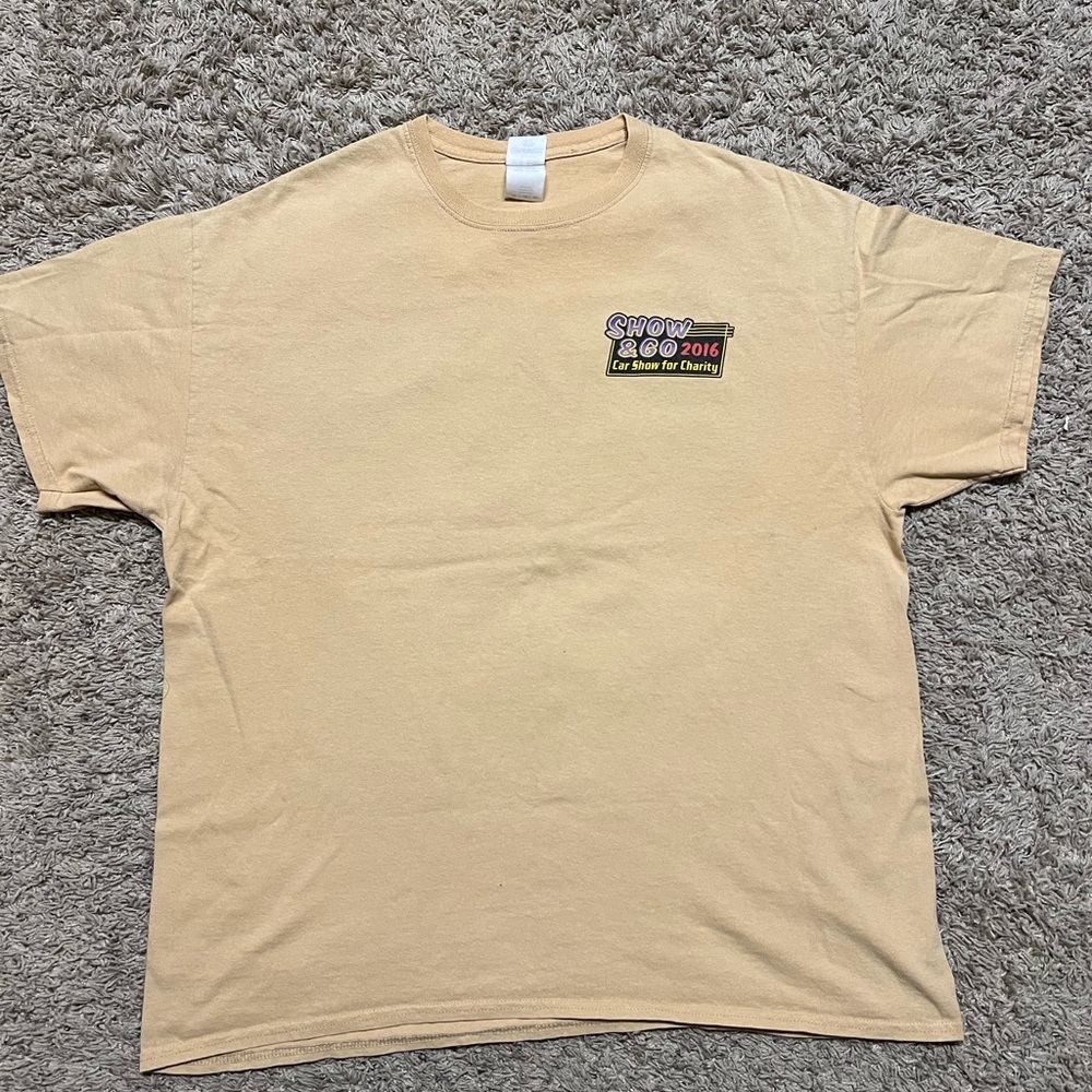 tan/cream colored show go shirt